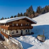 Chalet in Hopfgarten in Brixental with hot tub