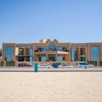 Hometown Apartments - Kite Palace - Lavish 7 Bedrooms villa on Kite Beach, отель в Дубае