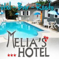 a pool at a hotel with a sign that reads mels hotel at Melia Hotel, Saly Portudal