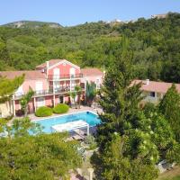 an aerial view of a house with a swimming pool at Corfu Pearl, Liapades