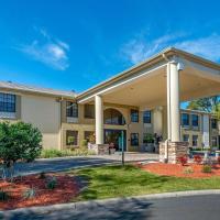 a large building with a pavilion in front of it at Comfort Inn Ocala Silver Springs