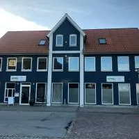 Den Skaldede Kok Guesthouse, отель в городе Биндслев