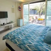 Sanyi Wei Wei Feng B&B, отель в городе Саньи