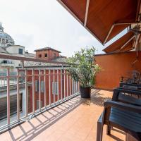 a balcony with a bench and a view of a building at Hotel Torino, Parma