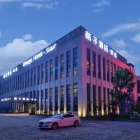 Orange hotel shanghai pudong Airport桔子上海浦东机场酒店提供浦东机场免费班车接送、上海市にある上海浦東国際空港 - PVGの周辺ホテル