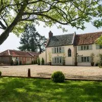 Holly Lodge Boutique B&B, hotel i Thursford