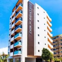 Yenns Marina Inn Mercy، فندق في غينوان