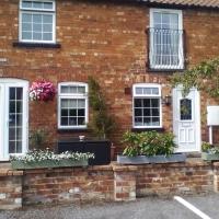 The Lincolnshire Poacher Inn, hotel in Metheringham