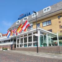 a building with flags on the front of it at Hotel Astoria, Noordwijk aan Zee