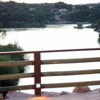LAS CABAÑAS DEL LAGO más pase piscina las 2 columnas Del 1 junio 2026 al 30 agosto 2026, hotel v destinaci Córdoba