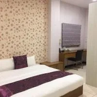 Rural Area Hotel، فندق في Wanqiao
