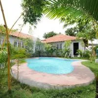 The Savoy Farmstay, מלון בDharmapuri