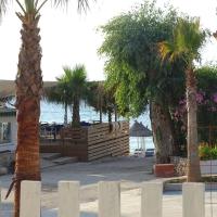 Seaside Cabin Ksamil, &xi;&epsilon;&nu;&omicron;&delta;&omicron;&chi;&epsilon;ί&omicron; &sigma;&epsilon; &Epsilon;&xi;&alpha;&mu;ί&lambda;&iota;