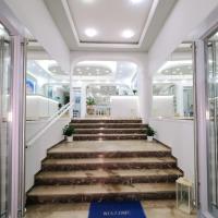 a set of stairs in a building with a welcome mat at Limnia Gi, Myrina