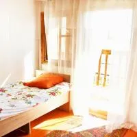 Guesthouse Bermet، فندق في Tong