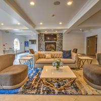 a living room with a couch and chairs and a table at Best Western Plus Media Center Inn & Suites, Burbank