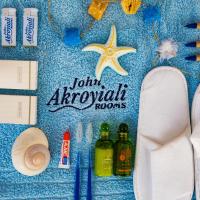 a group of items on a table with bottles of alcohol at John Akroyiali, Loutro