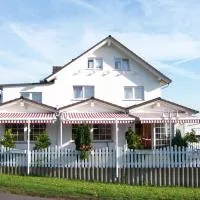Hotel am Kirschberg, hótel í Alten Buseck