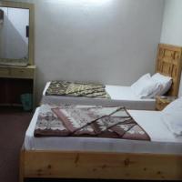 Naveed Tourist Inn, hotel in zona Aeroporto di Gilgit - GIL, Gilgit