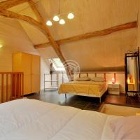 a bedroom with two beds in a room at LA FARIO 2, Gavarnie