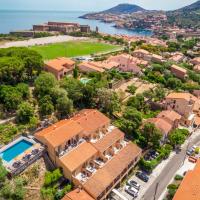 an aerial view of a residential neighbourhood with houses and trees at Le Madeloc Hôtel & Spa, Collioure