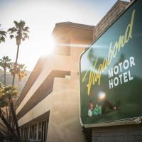 a sign for a hotel in front of a building at Vagabond Motor Hotel - Palm Springs
