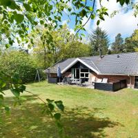 10 person holiday home in Henne