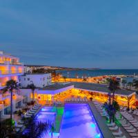 an aerial view of a hotel with a swimming pool at Limanaki Beach Hotel & Suites, Ayia Napa