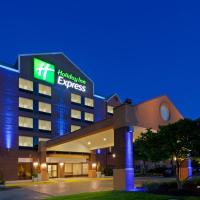 a hotel with a sign on the front of a building at Holiday Inn Express Baltimore BWI Airport West, an IHG Hotel, Hanover