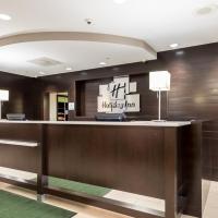 a lobby with a reception desk in a hotel at Holiday Inn - Indianapolis Downtown, an IHG Hotel