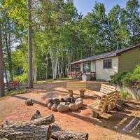Lakefront Cabin with Private Dock, Beach and Fire Pit!, hotel in Manistique