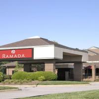 a building with a sign that reads ramada at Ramada by Wyndham Raleigh
