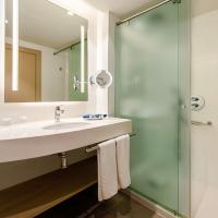 a bathroom with a sink and a shower at Spring Arona Gran Hotel - Adults Only, Los Cristianos