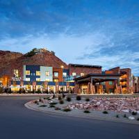 a large building with a road in front of it at Hyatt Place Moab