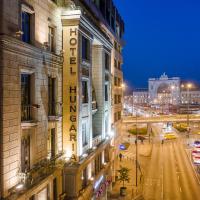 a view of a busy city street at night at Danubius Hotel Hungaria City Center, Budapest