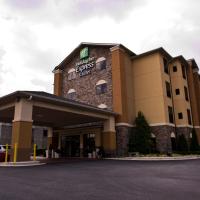 a hotel front of a building with a parking lot at Holiday Inn Express Hotel & Suites Atlanta East - Lithonia, an IHG Hotel