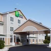a hotel with a sign on the front of it at Holiday Inn Express Hotel & Suites Freeport, an IHG Hotel