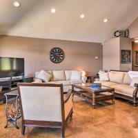 a living room with two couches and a tv at Spectacular Duck Creek Waterfront Retreat with Dock!, Afton