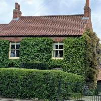 Country chic in unique English village, hotel in Nun Monkton