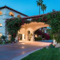 a building with an arch with flowers on it at Best Western Plus Las Brisas Hotel, Palm Springs