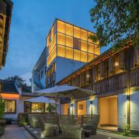 Floral Hotel · Yuexiang Inn Wuzhen, hotel in Wuzhen, Tongxiang