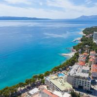 an aerial view of a city and the ocean at Hotel Park Makarska