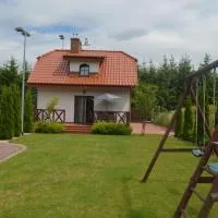 Domek nad jeziorem, hotel i Dąbrówno