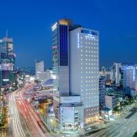 a city skyline with traffic on a busy highway at Toyoko Inn Seoul Dongdaemun II