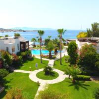 an aerial view of a resort with a garden at Costa Luvi Hotel - All Inclusive, Gümbet