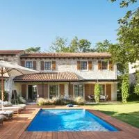 Meneghetti Wine Hotel and Winery - Relais & Chateaux, hotel em Bale