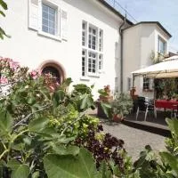 Bio-Weingut, Gästehaus und Kräuterhof, hotel u gradu Flomborn