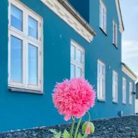 Det blågrønne Hus, hotel din Hals