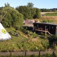 Tiny House mit Indianerzelt und Lagerfeuer im Harz, hotel in Benneckenstein