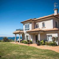 Chalet Pareado con Jardin en 1ª Linea de Mar